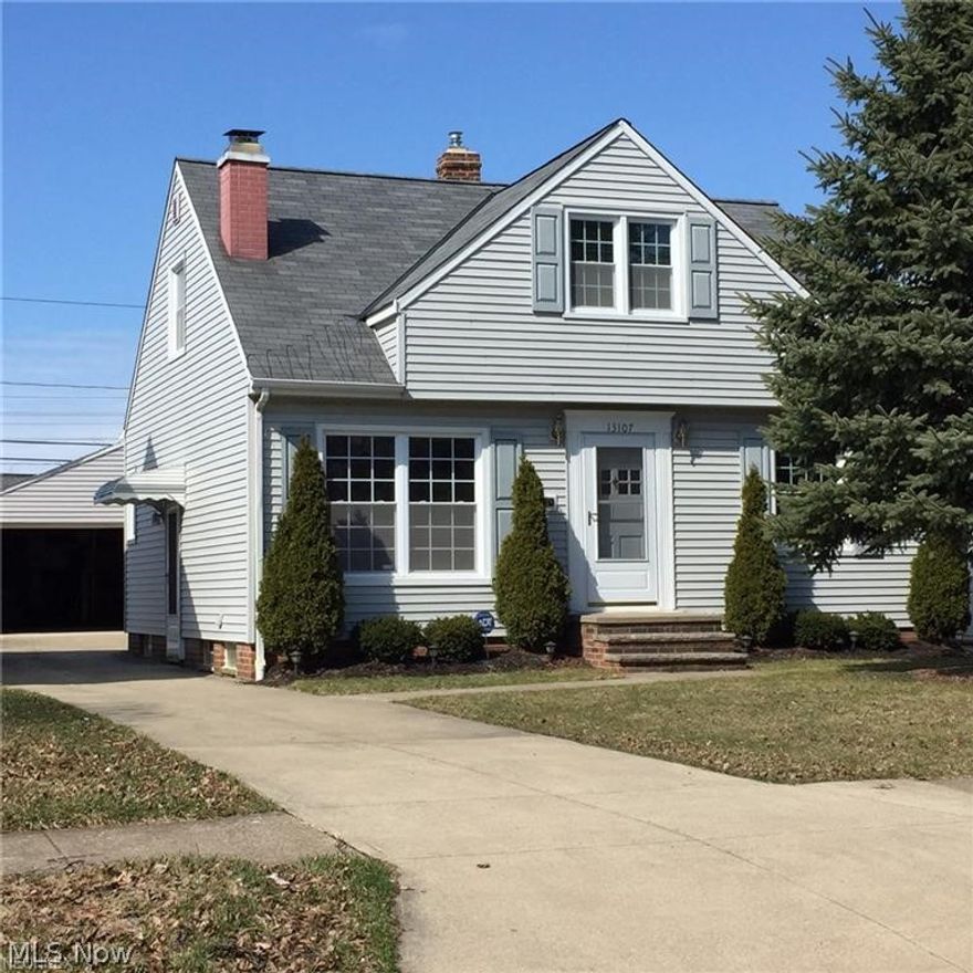 Very motivated seller! Bring an offer! City inspection complete and violation free! ADT security system! All appliances stay! Extra large garage perfect for a workshop! 220 electric line in the house and garage! Two full baths! Finished rec room in the lower level complete with bar! Glass block windows! Eat-in kitchen! Stone wood burning or gas fireplace in the living room! Newer roof, windows and siding  Newer furnace! The house has been completely waterproofed! Seller is anxious to sell! What are you waiting for? Make an appointment to see this house today!