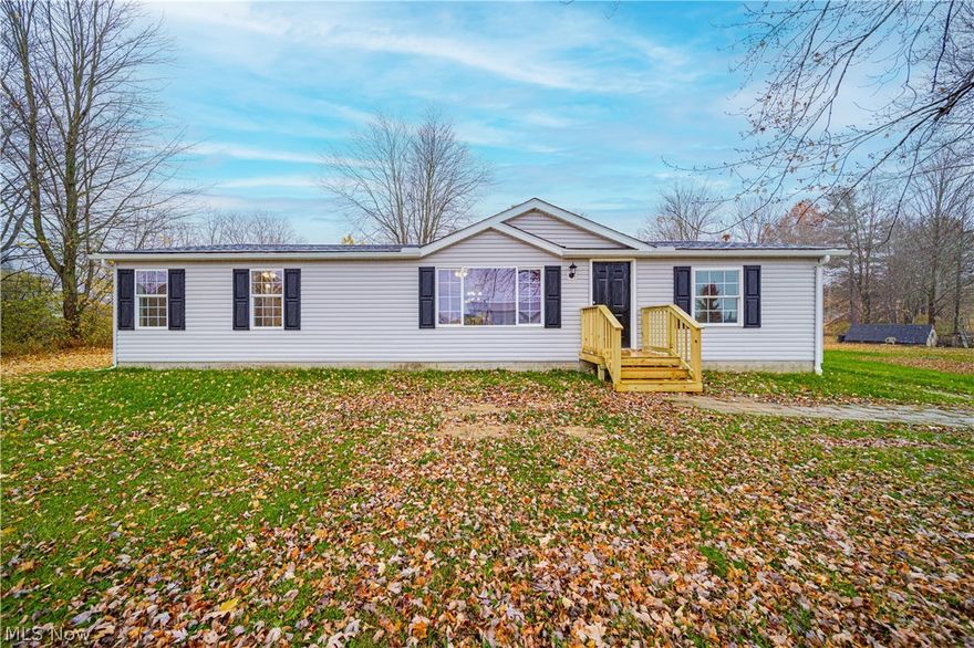 Check out this fully renovated open floor plan 3 bedroom 2 full bath ranch with plenty of room to spread out offering a little over 1.5+ acres sitting far back off the road. Upon entering the open living space the large primary bedroom is situated off to your left. You will have a deep walk in closet and oversized master bathroom equipped with double sinks and a shower bath combo. The 2 opposing bedrooms are on the right wing with a spacious shared bathroom also fully remodeled with a beautiful shower tiled up to the ceiling. New vinyl flooring with vaulted ceilings throughout and ceiling fans in the living room and all bedrooms. The kitchen has ample storage space within the brand new cabinetry offering a stainless steel dishwasher and microwave. Water heater is only 2 years old, water softener, central air, siding, roof, front steps, back deck and all of interior is brand new. 20 x 12 shed to store all the outdoor toys and lawn equipment. New lift pump and aerator on the septic. This