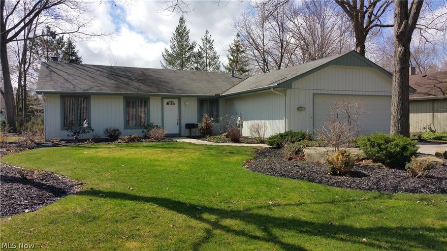 Meticulously maintained Ranch located right on the channel in a private lake community! Live like you're on vacation! Huge living room with corner brick front fireplace, crown molding & sliders leading to extra large kidney shaped paver patio. Computer controlled in-ground irrigation system draws water directly from channel to water entire yard (front & back) plus landscape beds. Additional deck & dock with built in bench seating on channel with new paddle boat ramp. New flooring in foyer & eat in kitchen '15, new hot water tank, updated bathrooms, formal dining room with crown molding, Enormous Master bedroom with enough room for sleeping & sitting quarters. Sliders lead from master to paver patio as well! Master bath with 5'x4' walk-in shower, & double vanities with double stainless steel sinks. All closets boast California Closet organizers. 305 acre lake for fishing, swimming, boating & waterskiing. 2 soft sand beaches, 2 in-ground pools, 4 tennis courts, 1 baseball diamond, 2 huge playground facilities, party rm, & a marina. Truley a special property in a special neighborhood. You won't find anything else like it in the Cleveland/Akron area. Won't disappoint!