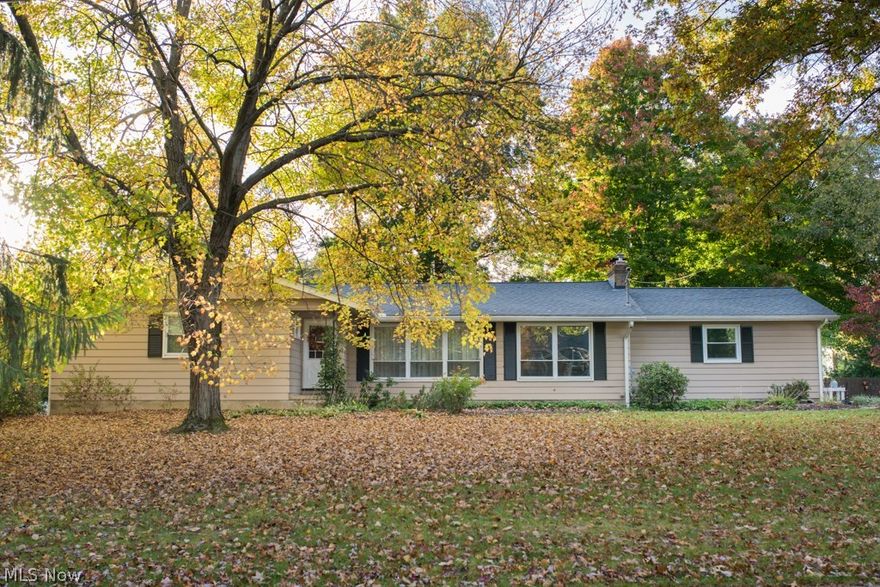 Welcome to this spacious Fairlawn ranch with numerous improvements: custom gourmet kitchen with Maple cabinets, granite counters, massive center island, Cherry floor, stainless steel appliances and an instant hot water dispenser; sun filled living room with crown molding; refreshed bathrooms; blown in insulation in walls & attic; newer windows; high-efficiency furnace  & A/C; professionally waterproofed with transferrable warranty and finished lower level, workshop, and plenty of storage.