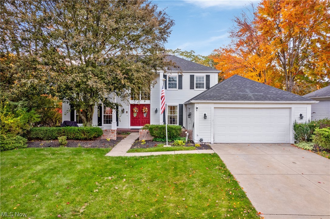 Nestled in the desirable High Point subdivision, this beautiful colonial offers a comfortable place to call home. The 2-story foyer sets the tone, leading to the formal living and dining rooms with gleaming hardwood floors and crown molding. Off the entrance, discover a convenient office space, perfect for remote work or quiet study. The kitchen boasts extensive cabinetry, granite countertops, stainless steel appliances, a peninsula breakfast bar, and a spacious eating area with a bay window. It overlooks the sunken family room, featuring a floor-to-ceiling stone fireplace, ideal for cozy winter nights, and sliding doors opening to the patio. Upstairs, the owners suite presents sweeping ceilings and an ensuite bathroom equipped with double sinks, a shower, and closet space. Three additional, generous sized bedrooms and a full bath with double sinks and granite countertops complete the second level. With the home backing up to the green area, with lake and walking paths you'll enjoy the serene, wooded backdrop from the expansive wooden deck and brick patio. There is a 2-car attached garage. Major updates include a new 35-year shingle roof '22 (complete tear-off), new carpet in the bedrooms '23, windows '15 & '19, appliances '18, furnace '14, granite '20, hardwood floors '10, and concrete driveway '12 - ensuring modern comfort and reliability. Don't miss the opportunity to own this home in the High Point neighborhood, which includes a zero entry pool, clubhouse & walking paths.