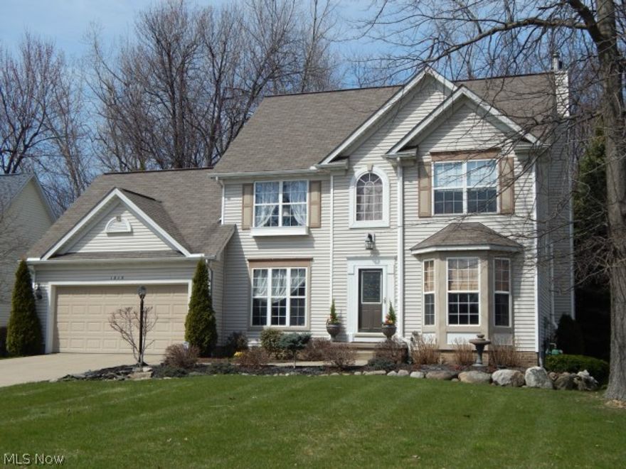 Outstanding four bedroom Heatherstone Colonial with a great open floor plan designed for entertaining! As you enter, beautiful hardwood floors run from the foyer into the dining room and down the hall to the family room. The spacious kitchen offers an abundance of counter space that will accommodate several high stools and is wide open to the eat-in breakfast nook and cozy family room with gas fireplace. The master bedroom features a cathedral ceiling, a large walk-in closet and attached bath. The finished basement is a perfect place for hobbies and family movie night. The wooded back yard allows you to enjoy nature from the privacy of your deck, there’s even a fenced area to secure your pets that is accessible from the garage and a yard gate. New furnace in May of ’14 plus a One Year Home Warranty, nothing to do but move in and enjoy, start packing!!!