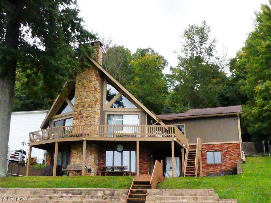 You are going to love this Lake Front Home!!  Gorgeous lake views, level lot to the lake and a 16 X 32 heated inground pool!!  Beautiful living room with a stone fireplace, vaulted ceilings and loads of windows to enjoy the view!!  Open kitchen and dining, master suite, loft, plus 3 additional bedrooms!  A total of 3 full baths, lower level family room with another fireplace.  This is the perfect house for entertaining and making memories at the lake.  2 story garage adds lots of much needed storage.  This one won't last!!