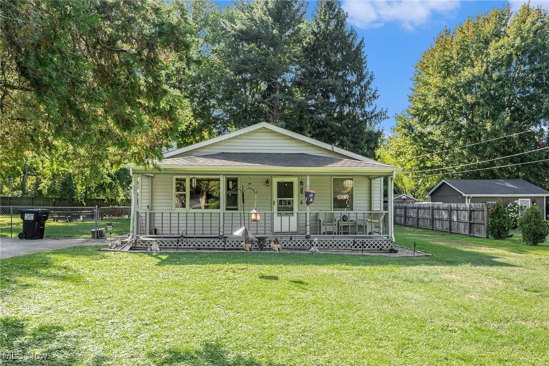 Welcome to 525 Morgan Street, a beautiful, well-maintained property on an over half-acre lot on a quiet street in Painesville Township, Ohio. This ranch-style home is move-in ready with recently installed carpeting in all four bedrooms, and new LVP flooring in the spacious Eat-In kitchen. The home also features two full bathrooms, a huge 19x28 Living Room, and a Laundry Room with an easy to access furnace and water heater. All appliances stay. The septic system was recently pumped out and inspected. Adjacent to the house is a large 36x38 four-car detached garage with electricity and a 9x12 storage shed. The backyard is also fully fenced in for your security needs. Enjoy quiet evenings by the fire in the fire pit with benches that stay with the property. The owners will pay for a one-year home warranty for the peace-of-mind of the new owner. This rare find is ready for you to marvel at it's many great features, so schedule your appointment today.