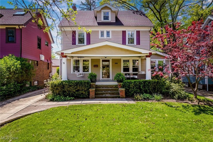 On a serene tree-lined street off the pages of a Norman Rockwell print, stands this outstanding center hall colonial with a charming front porch and in fabulous move in condition! The enchanting Living Room radiates warmth and timeless style - crown moldings, brick fronted wood burning fireplace with built in shelving, open and spacious. Then it seamlessly blends into the cozy Den with more built-in shelving, lots of windows and a door to back patio deck. Across the hallway, is the entertaining sized Dining Room with an original built-in corner cabinet. The Kitchen is perfect for the inspired home chef with all appliances, granite countertops, island with microwave, storage, updated lighting and built-in seating to make it the perfect eat-in Kitchen. The Half Lav was renovated to include re-tiling, a custom-built vanity, painting, lighting and commode. Up to the 2nd floor, the Full Bathroom has a tub/shower combination and...drum roll please...a 2nd floor laundry room with full-sized washer/dryer, cabinets, countertop for folding, storage and more built ins! Plus, there are three delightful and sizeable Bedrooms with plenty of closet space. Up another floor is the huge and welcoming 3rd Floor space offering so many possibilities of uses! There is custom built in bookcases with bench seating, refinished painted floors, painted walls and trim. The Lower Level is open with plenty of space for hobbies and projects. Inside the fully fenced Back Yard area is the two car Garage, an expansive relaxing Deck and a smaller deck area off the Den. It's a short jaunt to the Cedar-Lee area with its many shops, restaurants, and coffee shops that exemplify the Cleveland Heights vibe and its neighborhoods!!
