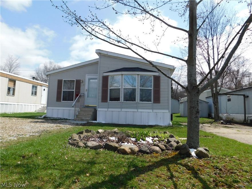This lovely double-wide manufactured home resides in West Park Mobile Homes within Blackhorse. The wood-burning fireplace adds an extra sense of warmth to this home. The laundry room has an exterior door that allows messes to enter before entering the rest of the home. Skylights and windows provide ample amounts of natural light. Close to several convenient stores, and just 13 minutes from downtown Kent. Get ready to begin your double-wide dream!