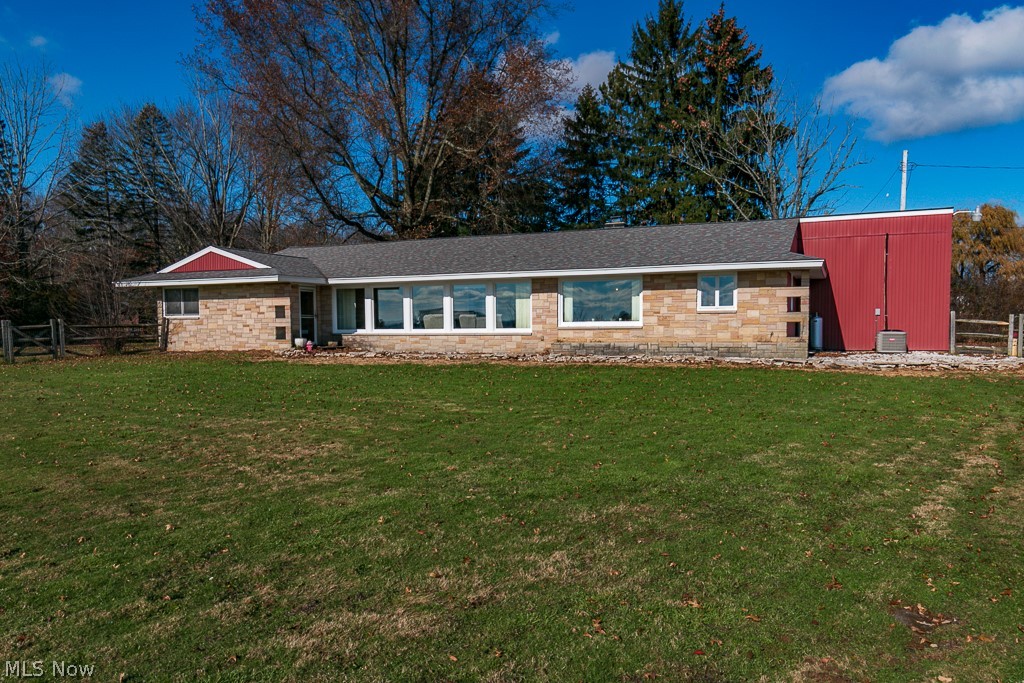 Enjoy breathtaking views and peaceful country living in this Frank Lloyd Wright inspired ranch home located just two miles north of downtown Middlefield. Nestled on 2 acres of fenced yard, this 3 bedroom, 3 bath home has many updates and tons of charm! With one floor living and 2,584 square feet, you’ll totally appreciate this open floor plan as well as ample storage and many built-ins which are a signature Frank Lloyd Wright design. Updates Include: *Partial kitchen remodel 2021 *New front stone walk 2021 *New well pump 2020 *Central A/C system 2019 *Walk-In Tub 2019 *Generator hookup 2019 *Tankless water heater in guest bedroom 2018 *Newer roof, siding, septic system, stainless steel kitchen appliances with propane cooktop (stay), reverse RO water, split rail fences and a 16x20 shed with electricity. This home has a radiant heated floors and central air for year round comfort. You'll love the spacious bedrooms with the third bedroom having an en-suite bathroom and separate entrance w