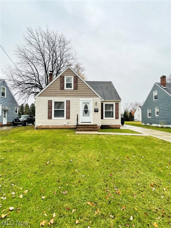 Welcome home! While coming up to this charming, updated home, you will notice the newer driveway. As you enter your new home, you are greeted with a large living room with wood floors, built in shelves, freshly painted throughout the home and an eat in kitchen. The kitchen features a dishwasher, stove, built in microwave, refrigerator, and plenty of room for table. Continuing through you will find two bedrooms with wood flooring and a full updated bathroom. Upstairs you have another bedroom, office, rec room etc. The very clean basement offers more space for work out area, family room, and plenty of storage space, laundry area with utility tub. Two car detached garage. New A/C. Ready to move right in!