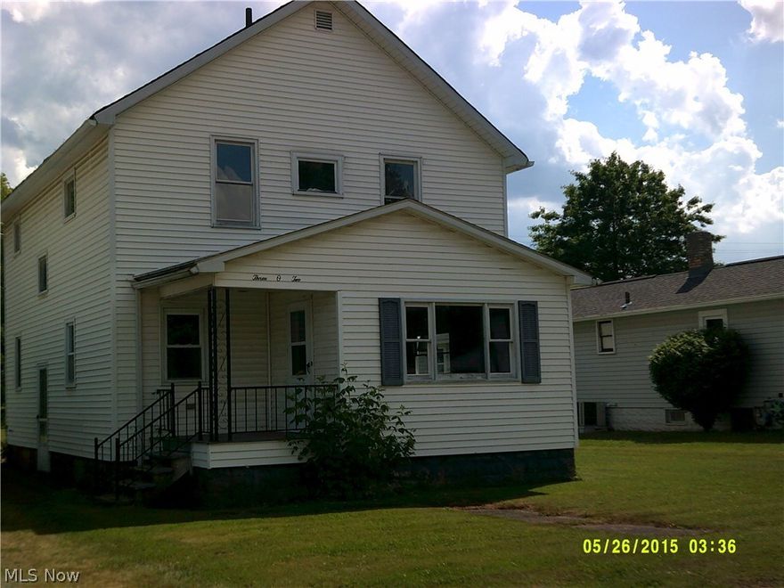 4 bedroom possible 5 bedroom large home. House needs floorcoverings, roof, bathroom window. Bath has tile & other items to be put back on.  This home sells AS IS. Extra large lot in floodplain. Water has only been in the yard not near the home.