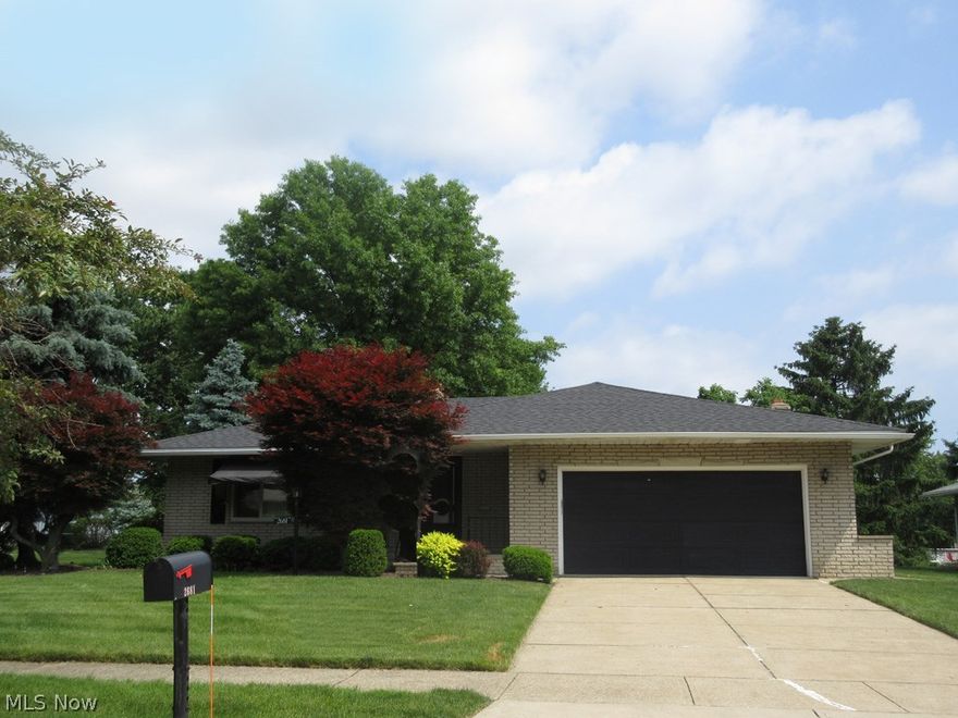 Meticulously cared for brick beauty with 3 bedrooms and 2 full baths. This lovely home offers a large foyer with ceramic flooring and opens to the living and dining rooms.  The spacious kitchen includes all appliances and overlooks the family room w/ sliding doors leading to the private patio and yard. Updates include: newly installed carpeting, freshly painted interior, energy efficient windows & patio door, furnace , central air, roof (2013), and front storm door.  The full basement has a finished recreation room, an abundance of storage, and a large laundry room.
Completing this offering is a 2-car attached garage, a covered patio, and a welcoming front porch.  Move right in!