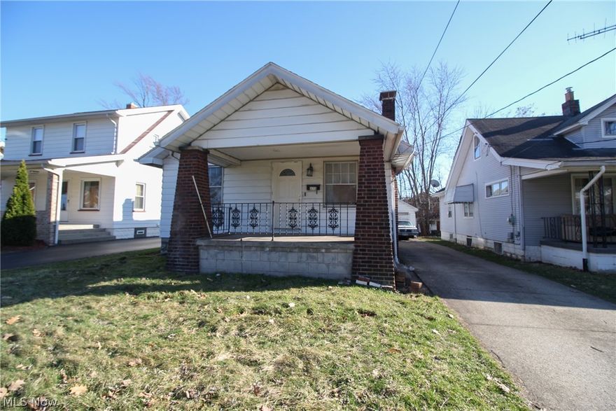 HUGEEEE INVESTMENT OPPORTUNITY!!! Check out this over 1,200 Sq ft Ranch located on Youngstown's South Side. Features include a large family room, formal dining room, updated kitchen, and even an updated bathroom! Complete with a newer vanity, ceramic tile and a ceramic tile surround! Additional features include updated electrical, full basement, porch, 1 car detached garage, partially fenced yard and even an extra 2 car carport!! This is a MUST see MUST buy! Would make a lovely investment to add to any portfolio or a place to rest your head!! Call today for a showing!!