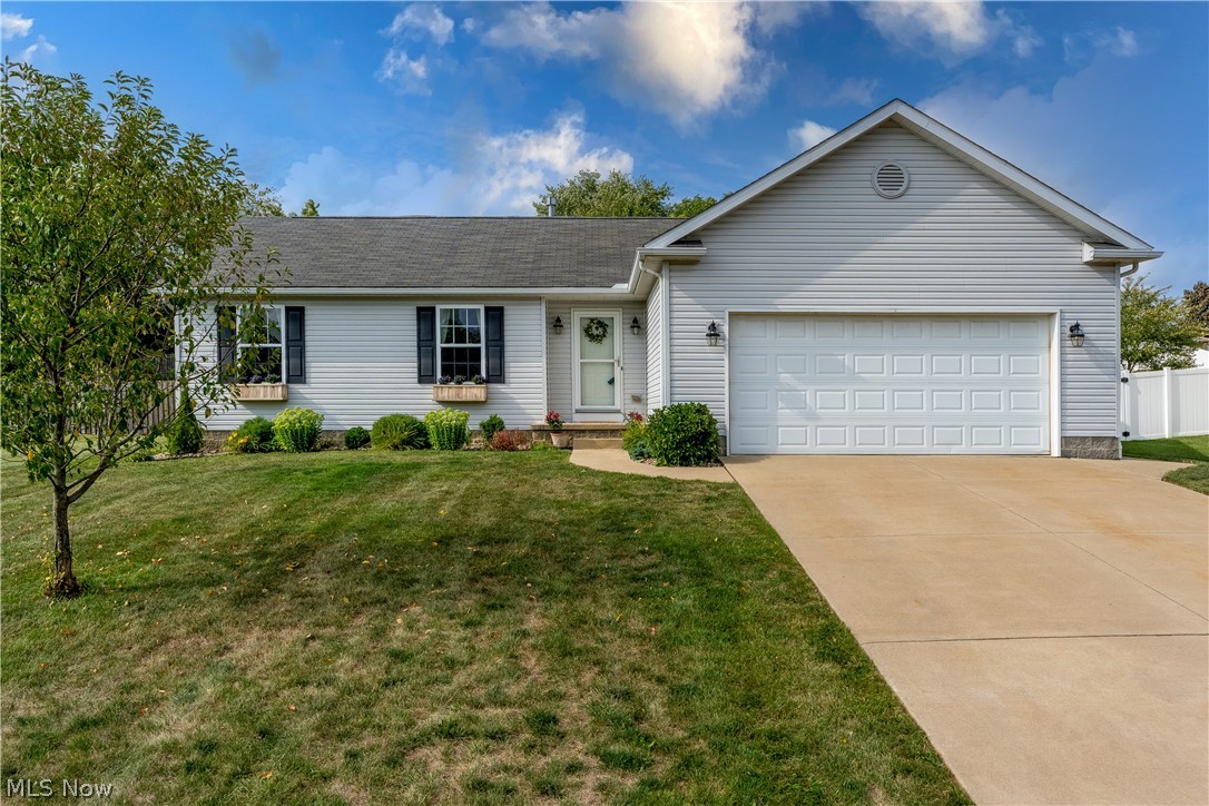 Wow! A ranch style home on a double lot with large area fenced in. Awesome patio and deck great for entertaining. Built in 2006 with three bedrooms and two bathrooms. Home has a nice open floor plan. There are granite countertops throughout and stainless steel appliances in the kitchen. Approximately 1658 square feet includes a lower level rec space with bar area. Rare find in Perry Township and Perry Schools.