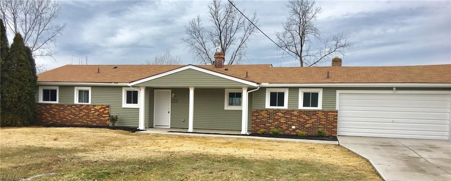 One floor living in Amherst School District! This incredible ranch has been completely renovated inside and out, there is nothing you will need to do but move in! The open concept living space has vaulted ceilings and gorgeous laminate wood flooring. The kitchen is a show stopper with a large island that opens up to the living space, soft close cabinets, granite counter tops, stainless steel appliances, custom tile backsplash, and recessed lighting. The master suite includes two closets, new plush carpeting, and a master bathroom with custom ceramic tile shower. The second full bathroom is brand new and there is a bonus half bath off of the laundry room. The large, 2 car garage has a bonus room off the back that opens up to the spacious backyard. Other updates include: new vinyl siding, all new windows and doors, complete electrical re-wire, all new plumbing, new insulation and drywall, brand new high efficiency furnace and central air, new driveway, sidewalk, and porch. You will not w