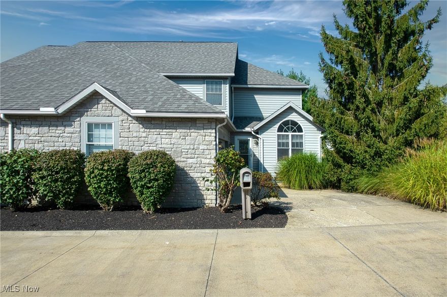 Live with ease in this serene Greystone condo overlooking a peaceful pond. Step inside to an inviting open floor plan featuring an eat-in kitchen with oak cabinets, stainless steel appliances, and granite countertops. The living room impresses with soaring two-story ceilings, a stunning stone fireplace, and plenty of space for both a dining area and a cozy living room setup. The first-floor primary suite offers tranquil views of the pond, a massive walk-in closet, and a spa-like en-suite with a soaking tub and walk-in shower. Upstairs, a versatile loft makes the perfect home office or family room, along with two spacious bedrooms and a full bath.
The newly finished basement has been waterproofed and comes with a lifetime warranty, plus a sump pump with a backup battery for peace of mind.

End your day on the back deck, enjoying the relaxing fountain sounds while having dinner or reading a book. This is low-maintenance living at its best in Greystone!