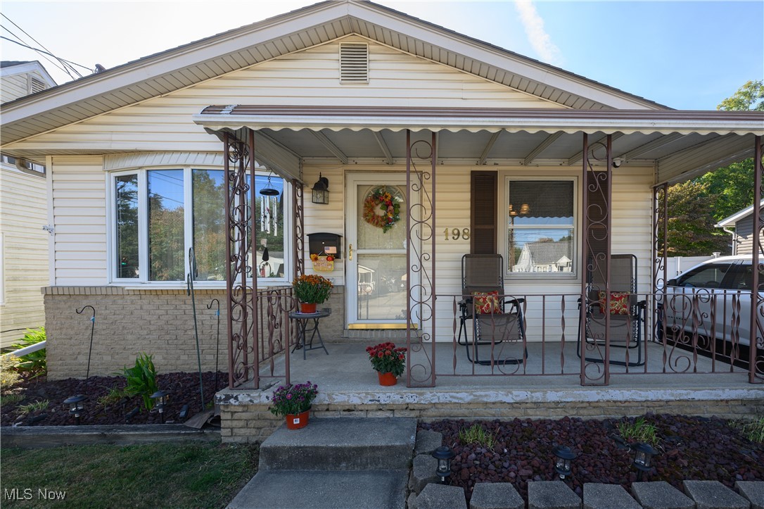 Welcome to 198 Hilbish Ave! Step onto the inviting covered front porch and through the front door into a spacious living room that flows into the kitchen, complete with newer appliances and a cozy eat in dining area. Down the hall, you’ll find three bedrooms, a full bath, plus a convenient half bath off the primary bedroom.The partially finished basement adds extra living space along with an additional full bathroom. Major updates were completed in 2022, including the furnace, A/C, roof, and hot water tank. Outside, enjoy the fenced in backyard and detached garage perfect for both relaxation and storage. Schedule your showing today!