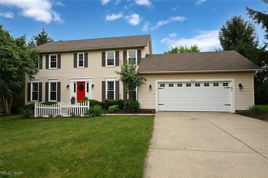 You do not want to miss this great opportunity to own a beautifully updated home in the highly sought after neighborhood of Ashbrooke in picturesque Hudson. This 4 bedroom, 2.5 bath colonial is located on a cul-de-sac street and backs to a green belt, enhancing the quiet tranquility you feel inside and out. The spacious entry foyer is highlighted by the turned staircase and wood floor. The foyer is flanked by the formal living room (which could be used as a home office/den/library) and dining room, both enhanced by rich hardwood floors. The wood flooring flows to the back of the house where you will find an updated eat-in kitchen featuring white cabinetry, granite counters w/breakfast bar, stainless steel appliances, pantry and sliding door access to the deck. The large family room opens to the kitchen and features a raised hearth wood fireplace and wood floor. The laundry room and a half bath are just off the kitchen. Upstairs you find the large primary suite featuring a large bedroom w/laminate floor, a generous bathroom with soaking tub, shower, large granite top vanity, tile flooring and access to the walk-in closet. Three additional bedrooms w/laminate flooring and an updated full bath complete the upstairs. The basement level is unfinished, offering you an opportunity to design addition living space. You will enjoy outdoor entertaining on the large deck overlooking the private back yard. Recent improvements include HVAC, wood flooring on the main level, interior decor and more. Schedule your private tour today, as this one will be sold in three, two, one......