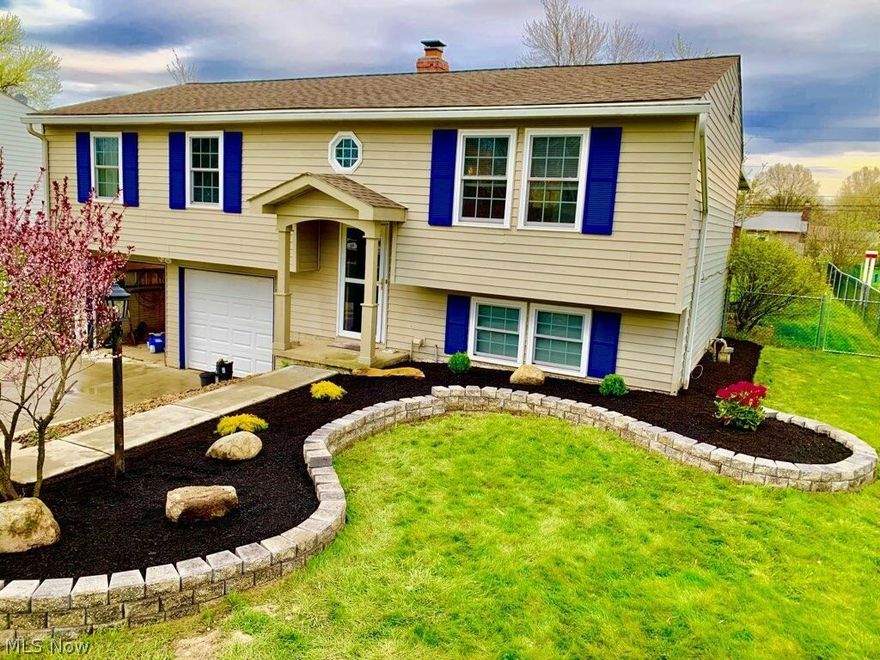 Living is easy in this wonderful move in ready Strongsville home. The spacious and recently updated kitchen truly is the heart of this home and is sure to provide many nights of enjoyment while cooking up your favorite meal. Melt away the days worries and grab some fresh air on the extra large rear deck with a working hot tub. No more windshield ice scraping with a super convenient attached garage! Beautiful outdoor landscaping will have you rushing home just to take in the curb appeal of your stunning new home. Windows were replaced within the last 3 years. Make this lovely home yours today!