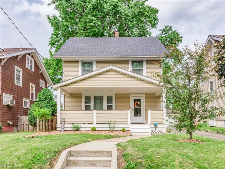Adorable, updated, and well-maintained colonial home just outside of Ridgewood in Canton. The inviting and cozy front porch welcomes you to this charming home with 9-ft ceilings and modern colors. The living room has a decorative fireplace/mantle with built-ins on both sides and plenty of natural light. It is open to the formal dining room with a wainscoting backsplash, laminate flooring, and built-in window seat storage. The kitchen offers tile backsplash, laminate flooring, appliances included, a composite granite sink, a large pantry, a bonus spice pantry, and access to the fenced-in private backyard. There is a conveniently located half bath on the main level too! Three bedrooms and full bath with ceramic tile floor and ceramic tile shower on the second level. The third floor 15x25 finished attic would be perfect for a rec room, playroom, or a 4th large bedroom! The full basement offers ample storage space. One car garage too. Updates include paint-interior (all but attic), new kit