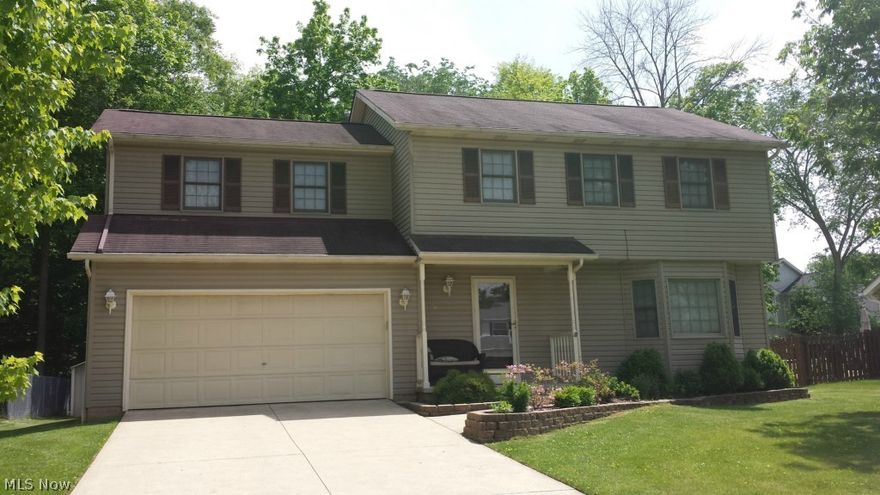 PRICE REDUCED Great location, Traditional colonial with 4 large Bedrooms (Master Bedroom has a vaulted ceiling), Kitchen has an eat-in-area, New Stainless Steel appliances in Kitchen. Dining room has a trey ceiling with double crown molding and chair rail. Stained Oak trim throughout.  Step down family room with vaulted ceiling and gas log fireplace. Deck (11 x 12) off Family room through sliders.  Roughed in full bath in basement.  Storage shed and play set stay in private wooded backyard.