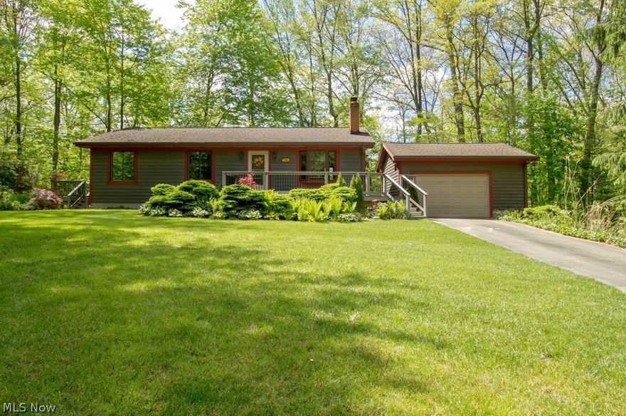 Wow! Affordable home! Welcome to 6271 Washington Street located in the beautiful Brady Lake Village. Built in 1982, this amazing 1092 sq. ft. ranch includes 2 bedrooms and 1 bathroom on the main floor. A second full bath with walk in shower was added in 2012 in the walk out basement. New cedar siding and Jeldwen Windows/slider were also added in 2012 to this updated home. This stunning ranch offers a ¾ wrap around AZEK® Premium composite deck, overlooks a serene wooded ravine full of wildlife and foliage. Perfect for both entertaining and that much deserved relaxing  private space.  A 2011 Custom kitchen Design/Installation includes: Cardell Solid wood cabinetry, Granite counter tops, Tile floors, designer lighting and Frigidaire Gallery Series stainless steel appliances.  The 24 x 24 Garage allows plenty of room for storage, maybe a gardening table and work bench as well.  New roof 2007 and New furnace and Central Air 2009.