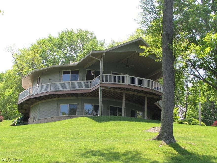 Perfect lake front home built in 2011, located on a point with gorgeous lake views. Open floor plan, corian and granite counters, first floor master suite, solid maple throughout, finished lower level, heated 3 car attached garage, lots of parking, large patio and covered deck, vinyl decking. A must see!