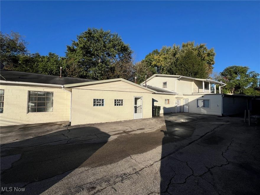 OPPORTUNITY IS KNOCKING! Check out this large 4 bedroom, 1.5 bath home with an attached 40x75 block building for potential storage space or your business. Situated on five parcels totaling a half-acre, this property can be accessed from Griswold Street or Albert Street. The house includes a living room, eat-in kitchen, family room and a first floor laundry room. The block building offers approximately 3,000 square feet of wide-open space, plus a full bathroom, laundry/utility room and plenty of parking. It's the perfect set-up to live in the house and operate your business out of the front building. Who doesn't love a short commute?? Call for more information.