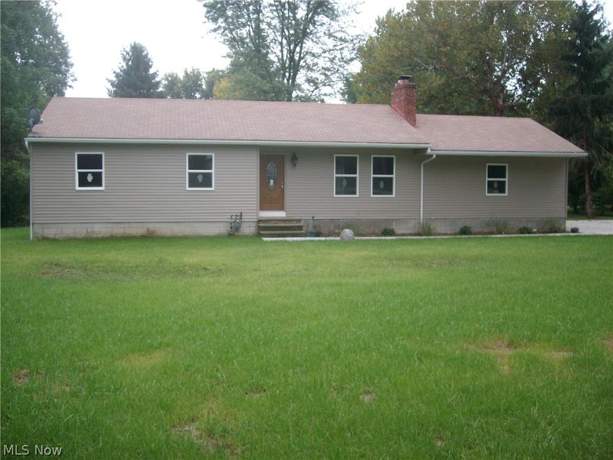 Beautifully remodeled ranch with 2 car attached garage.  3 bedroom and 1 1/2 baths, set on 1.25 acres.  Newer front door, garage door, Pella windows, siding, gutters, lawn, and concrete drive.  Inside features updated kitchen with granite counters, upgraded stainless steel appliances, and ceramic plank flooring.  Refinished oak floors throughout the open floor plan.  Remodeled full bath, 1/2 bath, and first floor laundry closet.  Upgraded mechanicals in full basement, including panel box, furnace, AC, septic, and water filtration.  Which all come with warranties for worry free living.  Must see!
