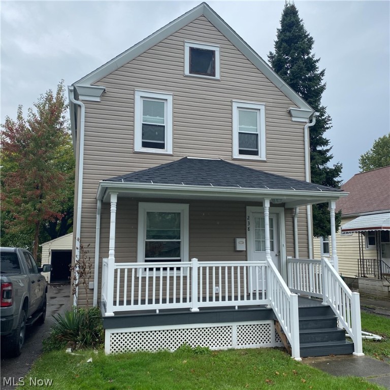 Welcome to 238 Olive St! Located in beautiful and historic Elyria. This extensively renovated colonial has everything you need to move right in. When you first walk in the home you are greeted with a spacious living area complete with newly installed, easy to maintain vinyl plank floors. The vinyl plank flooring continues through the dining room and into the kitchen. The kitchen which has been extensively remodeled is now finished with newer cabinets, counter tops and appliances. Half bath on the first floor. Upstairs you have two large bedrooms with newer carpet. Updated full bathroom to complete the look. Private back yard with large glass door to let in plenty of natural light. One car detached garage will keep the snow off your car all season long! Full size basement, newer roof, siding and windows! There is nothing you need to do to this home!