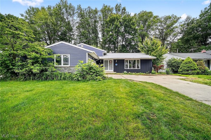 This well-maintained 4-bedroom, 2.5-bath home features an oversized layout with multiple living areas, ideal for both everyday living and entertaining. The main level boasts an updated eat-in kitchen complete with appliances, a formal dining room, and a large living room filled with natural light. A convenient half-bath was added on the main floor for guests.

The lower level offers a generous family room highlighted by a sandstone gas fireplace, perfect for cozy nights in. You'll also find a versatile fourth bedroom or home office on this level, giving you plenty of flexibility.

Upstairs, the primary bedroom is accompanied by two additional spacious bedrooms—all featuring real hardwood floors. The home is equipped with the comfort of hot water heat and central air, providing the best of both worlds.

Step outside to the beautifully stamped concrete patio overlooking a large, fully fenced backyard with a storage shed. Additional highlights include updated windows, a 2-car side-load heated garage, and plenty of storage space in the basement, including a dedicated storage room and laundry area.

This home truly checks all the boxes—space, updates, charm, and location. Schedule your private showing today and see why 341 Michigan Ave could be your next home!