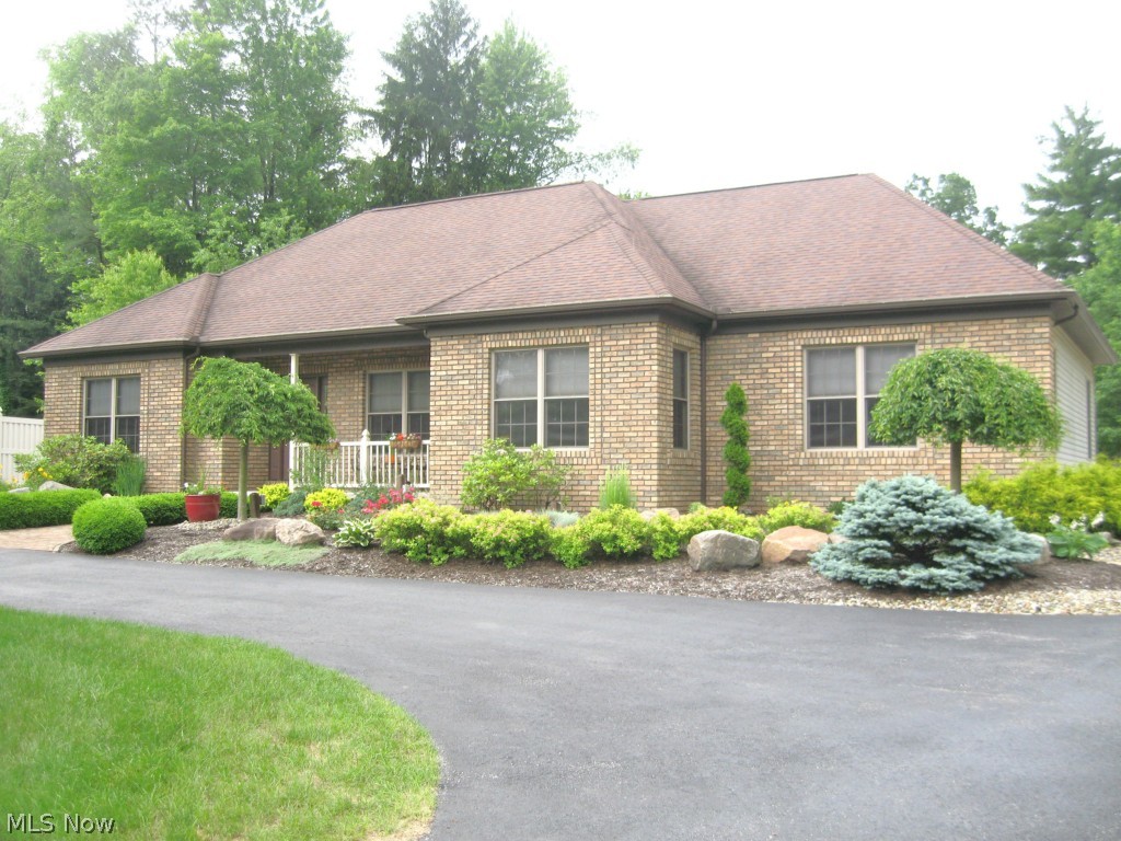 PRIDE OF OWNERSHIP is evident in this exceptional ranch built in 2001 situated on 1 acre. Professional landscaping, absolutely beautiful! 2231 sq ft plus additional 1897 sq ft finished lower level - 4078 total sq ft. 3 Bedrooms, 3 1/2 Baths, Dining Room, 1st Floor Laundry. Kitchen - Cherry cabinetry, corian counter tops & stainless appliances. Breakfast Room - great views for morning enjoyment. Foyer & Great Room - w/cathedral ceilings, stone fireplace, two sets of French doors to Deck overlooking heated in ground pool. Vinyl fencing adds to the privacy of this tranquil setting. Attached 2 - 1/2 Car Garage with 1/2 bath for swimming convenience. Detached 3 plus Car Garage. First Floor - 9 foot ceilings, 6 panel doors, hardwood flooring, & cherry woodwork. Lower Level - all oak trim & carpet. Family Room corner fireplace w/blower. Oak Kitchen - fully appliance with corian counter tops. Pool Table Room - pool table stays! Full Bath. To many amenities to list. CALL FOR AN APPOINTMENT. Ho