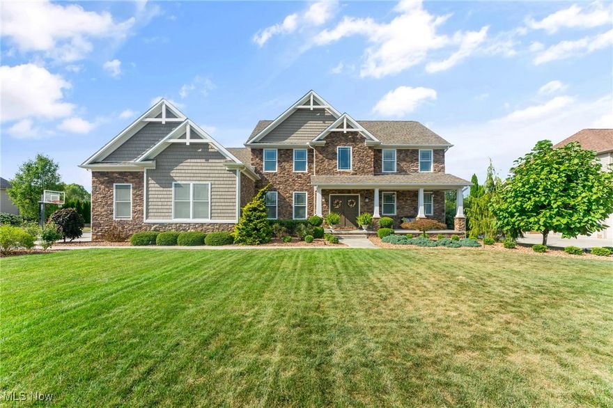 Nestled within the prestigious Fox Den neighborhood, this impressive residence offers over 3,100 sq. ft. of living space plus a beautifully finished basement, with 4 bedrooms, 4.5 baths, and a 3-car garage. Designed for both elegance and everyday living, this home is a perfect fit for families who value comfort, style, and entertainment.

The main level features a convenient first-floor laundry with a custom locker-style drop zone, along with an updated kitchen that seamlessly flows into the inviting living room. Hardwood floors, a gas fireplace, and custom built-ins create a warm yet refined atmosphere, ideal for both entertaining guests and relaxing evenings at home.

Upstairs, the luxurious owner’s suite boasts a spa-like custom bathroom and an oversized walk-in closet. Bedrooms 2 and 3 share a Jack-and-Jill bath, while bedroom 4 enjoys a private en suite—perfect for family or guests.

Step outside to your private backyard oasis. A covered rear porch overlooks the heated in-ground pool with slide and fountain, a soothing hot tub, and a fully fenced yard with plenty of space for children or pets to play. Whether hosting summer gatherings or enjoying quiet evenings, this outdoor retreat balances fun and relaxation.