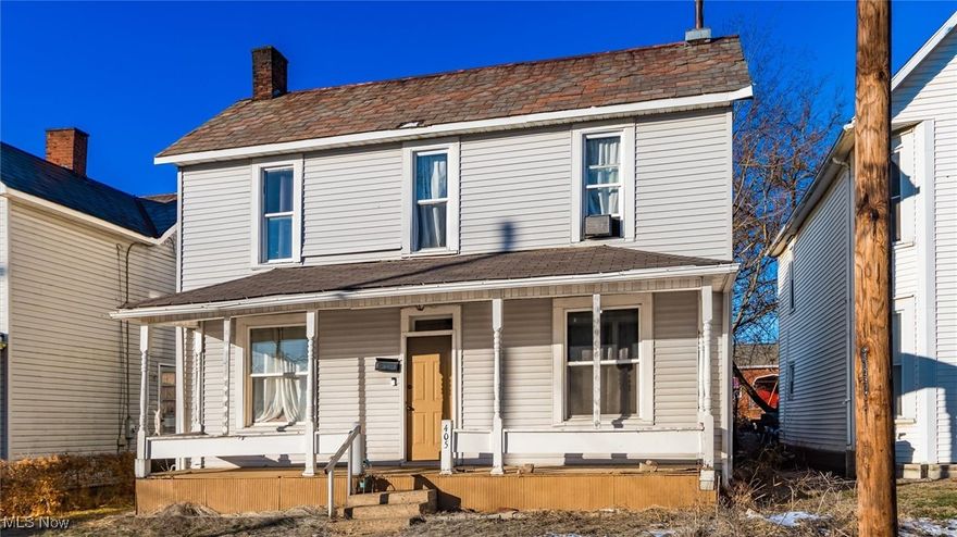 Built in 1890, this 3-bedroom, 1.5-bath home offers a blend of historic character and practical updates across 1,470 square feet. Hardwood floors add warmth to the main living areas, and the layout includes a main-floor bedroom, main-floor laundry, and two additional spacious bedrooms upstairs.

A generously sized traditional dining room sits just off the kitchen, offering a comfortable space for everyday meals or gatherings. The kitchen is compact and functional, making efficient use of space. Neutral finishes throughout allow for an easy move-in with the opportunity to personalize over time.

A covered front porch and back porch provide additional outdoor space, while a carport with alley access offers off-street parking. Conveniently located near dining, shopping, and daily essentials. A great option for buyers looking for a home with character and room to make it their own!