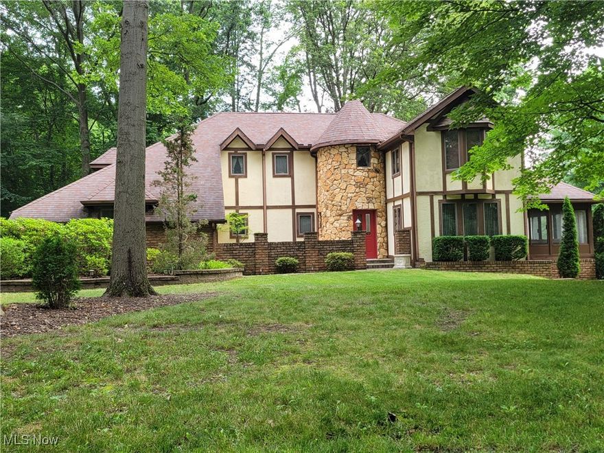 Beautiful Tudor-Style Home in Kent, Ohio – Spacious Family Living Awaits!Discover the charm of this well-maintained, owner-occupied single-family home located at 1585 Kent Street. Built in 1981, this 3,494 square foot residence features a spacious layout perfect for family living, complemented by an additional finished walk-out basement.Key Features:3 Spacious Bedrooms: Generously sized rooms providing comfort and privacy.Multiple Living and Dining Areas: Perfect for entertaining or family gatherings.3 Full Baths (including a half-bath): Convenient facilities for all family members and guests.Two Three-Season Rooms: Enjoy the beauty of the outdoors year-round.Two Attached Two-Car Garages: Ample parking and storage space.Concrete Driveway: Durable and easy to maintain.Property Highlights:Situated on approximately 0.40 acres, encompassing three parcels for added privacy and space.Essential utilities include well water and city sewer, ensuring convenience at all times.This stunning Tudor-style residence offers a perfect blend of functionality and elegance, making it ideal for family living. Don’t miss this opportunity to make this exceptional home yours!