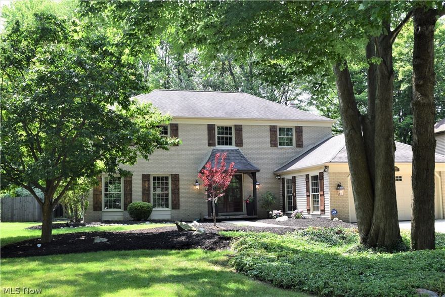 This spacious, 4 bedroom, 2 full and 1 half bath French Country Colonial has been completely renovated.  A stately, custom solid wood double front door welcomes you into the open floor plan with gleaming oak hardwood floors. Gourmet, eat-in kitchen, large center island, quartz counter tops, stainless steel appliances, pot filler, stainless steel hood, storage and counter space galore.  Large formal living room and dining room.  A great room with gas fireplace with remote.  An office and large laundry room with shelving and closet for additional storage complete the first floor.  The master bedroom has a private balcony, walk-in closet and glamour bath with rain fall shower head.  Three more large bedrooms and another full bathroom await you on the second floor. Large, fully finished basement with tons of storage.  Two-car attached garage.  A must see, with park-like backyard and stamped concrete patio, fire pit, koi pond with waterfall and hot tub.