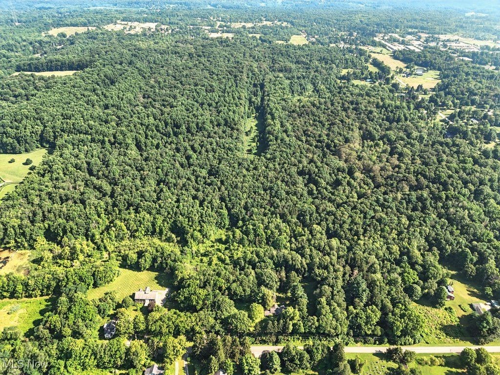 Rare Geauga County Multi-Parcel Estate Opportunity
Some parcels are zoned for mixed-use.
Welcome to this extraordinary 12-parcel package featuring over 175 acres of vacant land and six income-producing homes, located just moments from the Geauga Park District’s West Woods Nature Center. With access from both Music Street and Sperry Road, this property offers endless possibilities for private estate living, development, or investment.
One highlight is the converted barn, now offering over 3,600 square feet of updated living space combined with a working barn area. This three-bedroom residence showcases panoramic views of the expansive land behind it, providing unmatched peace and seclusion.
The Victorian-style home, built in 1831, combines historic charm with modern practicality. Featuring five bedrooms and two and a half baths, this home has been thoughtfully updated to accommodate today’s living needs while preserving its original character.
The remaining homes are currently leased to tenants. Leases can be assumed for immediate rental income, or tenants can vacate with 60 days notice to accommodate your personal or development vision.
This is a unique offering of size, diversity, and location, with proximity to protected parkland, equestrian facilities, trails, and all that Geauga County offers. Extensive details, parcel maps, and income data are available in the supplements upon request.
Individual parcels will not be sold.
Parcels included in the sale:
1. 23-385328
2. 23-385738
3. 23-094500
4. 23-142000
5. 23-385533
6. 23-141700
7. 23-141800
8. 23-385624
9. 23-385625
10. 23-385332
11. 23-141900
12. 23-312100