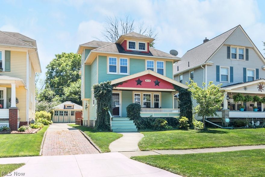 Welcome to this absolutely charming colonial nestled on a tree lined street.  You will fall in love with this freshly painted dollhouse from the moment you walk up starting with the lovely front porch with custom bench.  Upon entry you will be greeted with rich wood finishes and gleaming hardwood floors throughout the living and dining room. which also features a built in storage bench.  The kitchen has been updated with custom wood cabinetry and built in breakfast nook which compliments the period of this home.   Three bedrooms all up feature wood floors and fresh new paint.  Main bath has been remodeled and boasts a second floor balcony.  The finished third level would make a great play room or childs bedroom.  The finished waterproofed lower level is great for added entertaining space and includes a half bath.  Partially fenced in back yard with large deck finish of this perfectly move in ready home.  Call today for your private tour before this gem is gone.