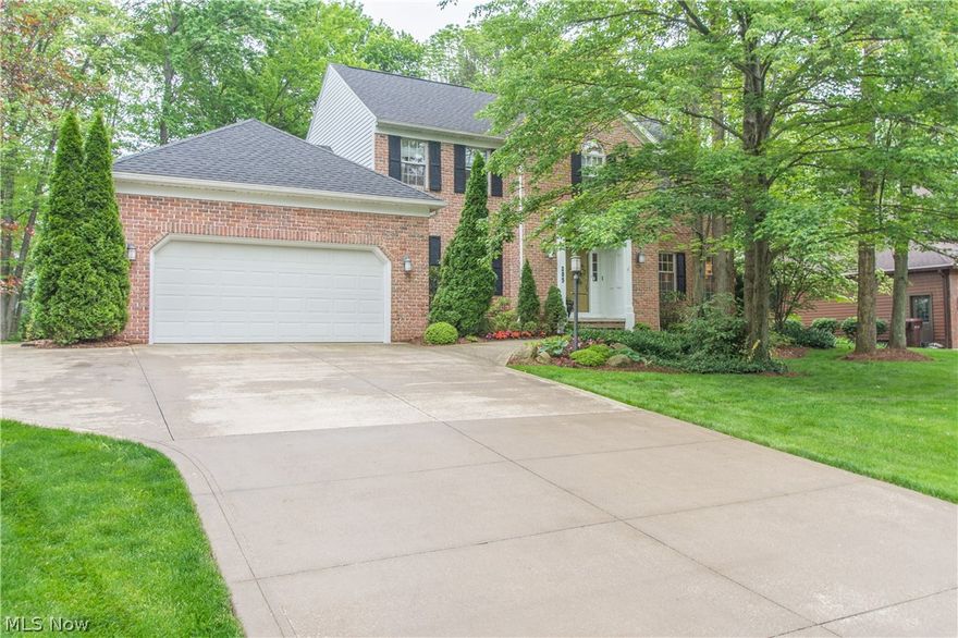 Welcome to this "1 of a Kind" Phenomenal Beauty! This home has been meticulously updated & customized.  Redesigned by Joel Wolfgang Interior Design & Classic Design Homes, the kitchen features Brookhaven cherry cabinetry w/under cabinet lighting, 2 pull out pantries, Ubatuba granite countertops, & cherry hdwd flooring.  As if that wasn't enough the kitchen provides high end appliances including double built-in Sub Zero wine coolers (dual temperature) & a Sub Zero refrigerator.  Pella sliders lead to a gorgeous backyard oasis.  The landscape was designed by Dwayne Crawford & includes a brick gazebo w/ceiling fan, fire pit w/gas line, stone walkways, wooden bridge & play gym. With plenty of room to entertain, this home offers a formal dining rm, living rm w/French doors to the media rm, & a fireplaced family rm where the custom built-ins open for a desk area & close for an entertainment center/the pendant lighting is incredible!  A winding staircase leads to the 2nd floor where you'll fi