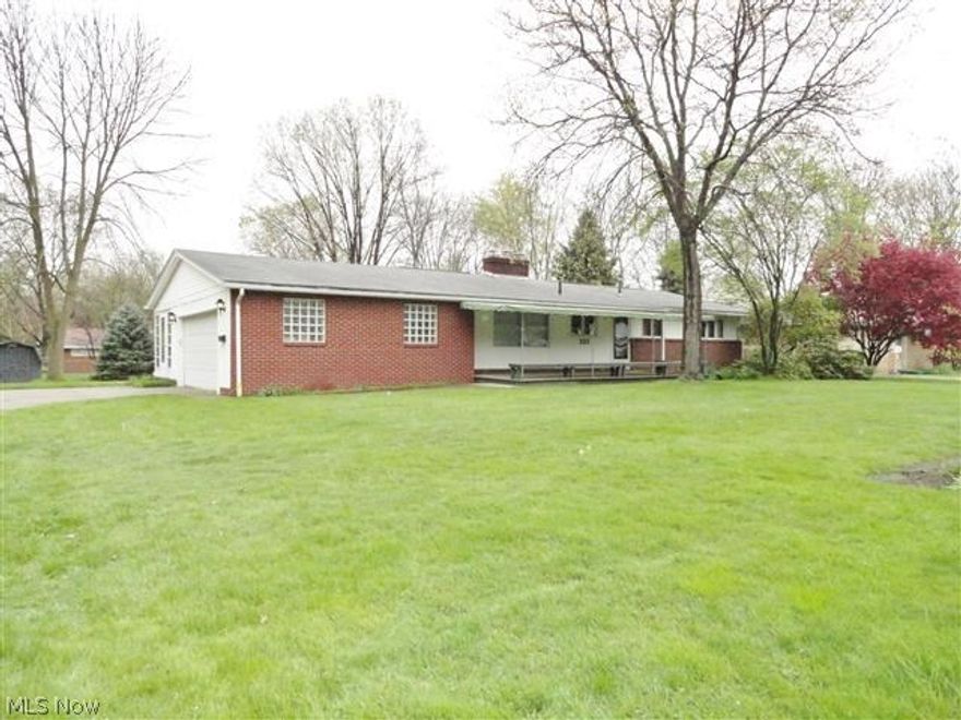 Quality built and nicely maintained contemporary ranch with 3 bedrooms, and two full baths. Large awning- covered front porch with built-in benches. Two car attached garage. Living room with shed ceiling opens into 3 season sun room. The kitchen has lots of cabinet space, all appliances included and opens to the dining area. Nicely landscaped backyard can be viewed from the large living room window. All three bedrooms have double closets with organizers. Hardwood flooring under the carpeting. Basement has been waterproofed, has a second fireplace and is ready for you to finish into a large rec room and workshop or office. Within walking distance to parks. One year home warranty included. Desirable North Canton location!