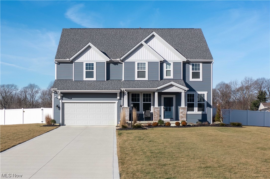 Welcome to 1602 Greenbriar Run! This stunning house is illuminated at night,offering a comfortable and stylish living space with 3 bedrooms, 2.5 bathrooms. As you approach the house, you'll notice the decorative grey tone limestone that wraps around the entire perimeter of the fence. Not only does it add a touch of elegance, but it also eliminates the need for weed whacking, making maintenance a breeze. Step inside and discover the modern features like a tankless water heater ensures you'll never run out of hot water, while a security system with video doorbell and front and rear cameras provides peace of mind. One of the highlights of this home is the super shower in the master bathroom. Equipped with wall mount and rain shower Moen fixtures, it offers a luxurious bathing experience. Quartz countertops can be found in both the kitchen and all bathrooms, adding a touch of sophistication. The oak staircase with iron railing adds an elegant touch to the interior design. The family foyer entry bench provides a convenient spot to take off shoes or hang coats. No more lugging laundry up and down stairs as there is a second-floor laundry room complete with a laundry sink other features include a half bath rough-in in the basement, two-tone cabinets in the kitchen, a direct vent hood, and a stylish backsplash. The living room boasts a beautiful 42' fireplace that creates a cozy atmosphere on chilly evenings. Appliances included are Kitchen Aid dishwasher, stove, and Whirlpool microwave. Blinds on all windows ensure privacy while still allowing natural light to fill the rooms. There is a 10 x 14 storage shed offers plenty of room for all your outdoor equipment. To enhance your comfort, luxury window tint has been applied to the living room's two-story windows, reducing sun glare and regulating temperature. Craftsmen woodwork in the dining room and staircase adds a touch of elegance and charm. Don't miss the opportunity to make this house your home. Call Today for a showing!