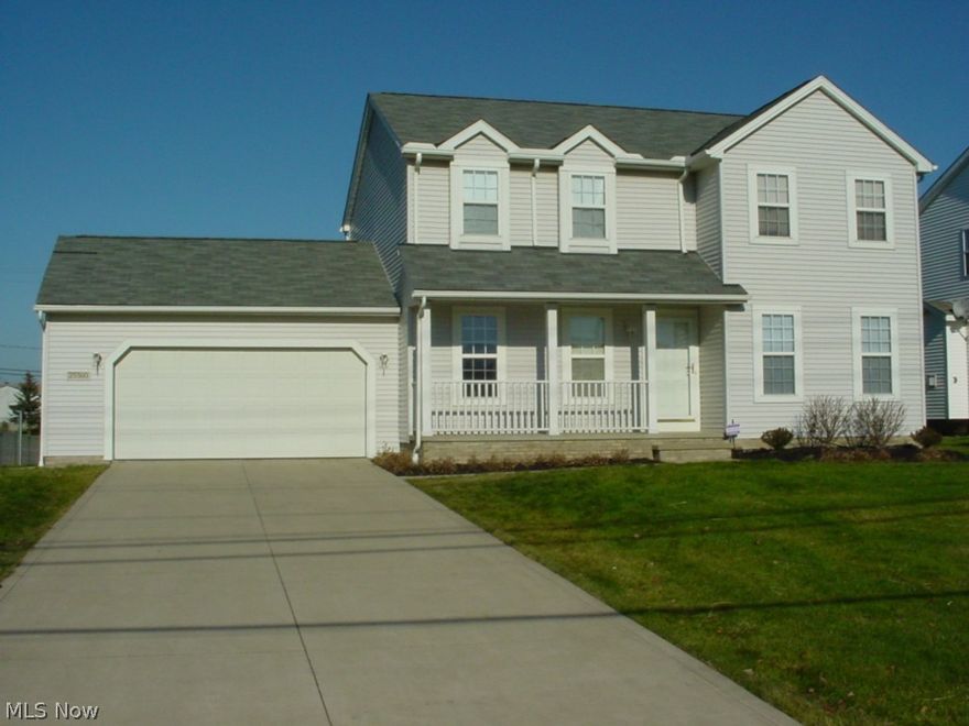 large colonial with three large bedrooms and three bathrooms, large eat-in kitchen with granite, dining room, living room with fireplace, large master bedroom with walk-in closets and granite in bathroom, wood deck off eat in kitchen, laundry room off kitchen, finished basement and attached garage; near Oakwood Village