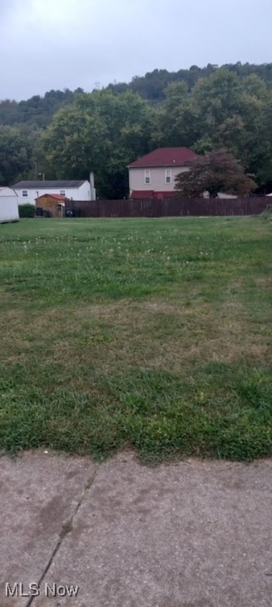 This land is ready for you.  It used to have a home on it so it has access to water sewer and gas, for this price you can't go wrong.  Give us a call today.