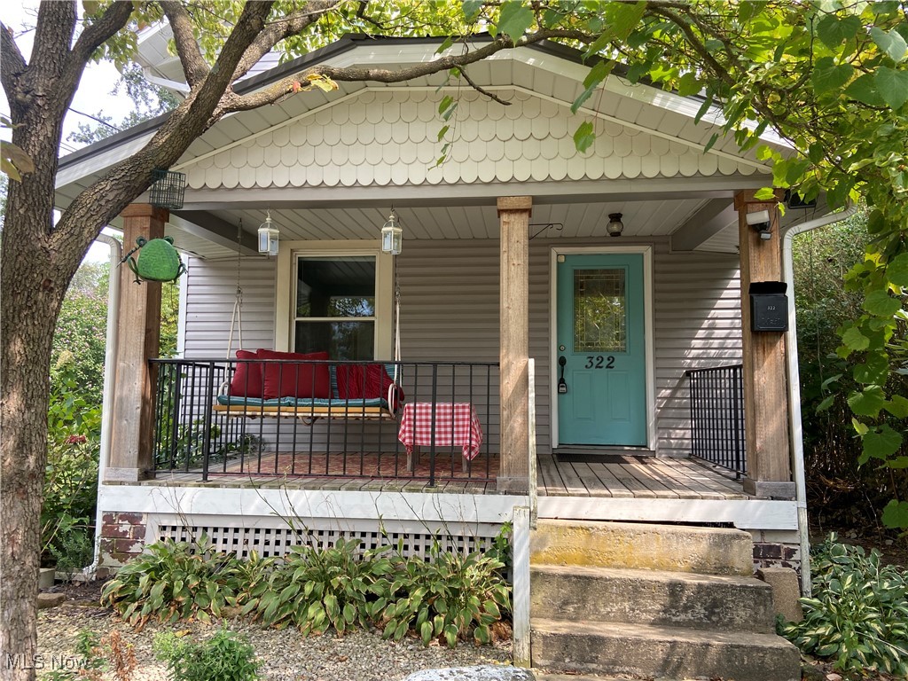 This delightful 2-bedroom, 1-bath home blends classic character with thoughtful updates, making it an ideal starter home or turnkey rental. Step inside to a cozy layout spread across two stories, featuring a generous living area and an updated spacious eat-in kitchen.Enjoy peace of mind with numerous recent upgrades, including a durable metal roof (2020), vinyl siding, newer (2020) hot water heater, and central air for year-round comfort. The fully fenced backyard is perfect for pets, kids, or quiet outdoor relaxation all sitting on two parcels. Unwind on the inviting front porch, complete with a charming porch swing and newly installed historic railing salvaged from the Wooster Inn—a unique touch that adds timeless charm. Don’t miss this opportunity to own a move-in-ready home with character, comfort, and convenience. Call today for your private tour!