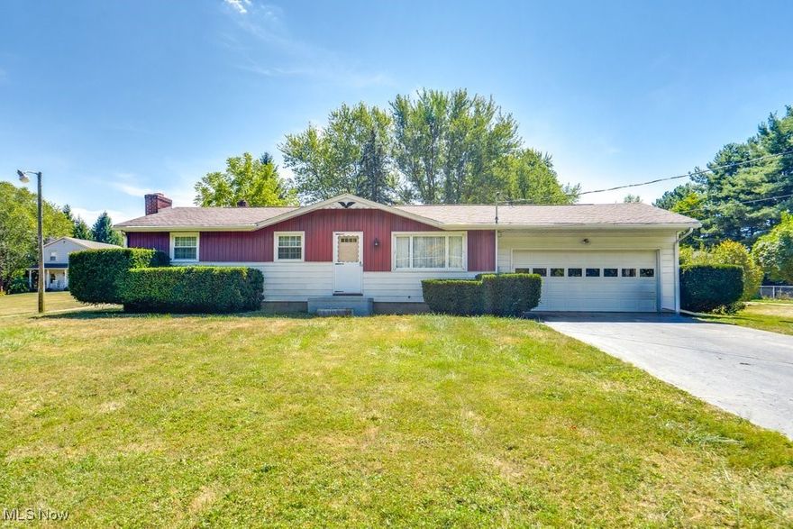 This cozy ranch at 12222 Cenfield St. NE, Alliance was built well AND well loved by the same family for over 2 generations! It is conveniently close to Louisville, Alliance, Salem, and Canton and located in the Marlington Local School District. This 3 (possibly 4) bedroom, 2 full bath, home had an addition added later that could be used in so many ways. It could be set up to be separate, private suite, a nice main bedroom, or even an extra family room and dining room! The kitchen was updated as well and has beautiful oak cupboards and plenty of storage. Not only has it been loved, it has been well cared for too! OAK flooring under carpet in the original living room, hallway, and bedrooms too! The full basement that is partially finished is great for any extra space you need. The lower level, finished room has extra insulation making it sound proof and perfect for a music room, home theater, etc! The two car, attached garage is fully insulated. The spacious back yard is a big bonus to this gem! The furnace and central air are new within the last year. The roof is less than 10 years old! The Sellers have worked through the long process and are getting a complete new septic system installed too!  Last but not least, there is an electrical outlet outside that is set up for a gas generator hook up to power the home if needed. Quite a plus to get you through outages! Quality, Updates, Space, and LOCATION! Nothing left to do but make it new for YOU!