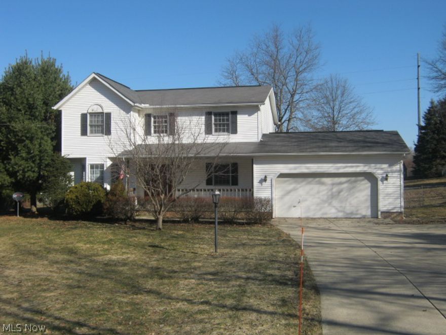 Wow! Updates galore.  Newer carpet and paint throughout.  Airy, open floor plan.  Spacious living areas, and kitchen.  Gas fireplace in family room.  Formal dining room.  Massive Master Suite with huge walk - in closet, dual sink, tub and shower in master bath.  First floor laundry. Extra large basement could easily be finished for extra living space. Newer hot water heater and water softener. 2 car attached garage and fully fenced back yard.  Easy access to highways and Robinson Memorial Hospital.  Call now.