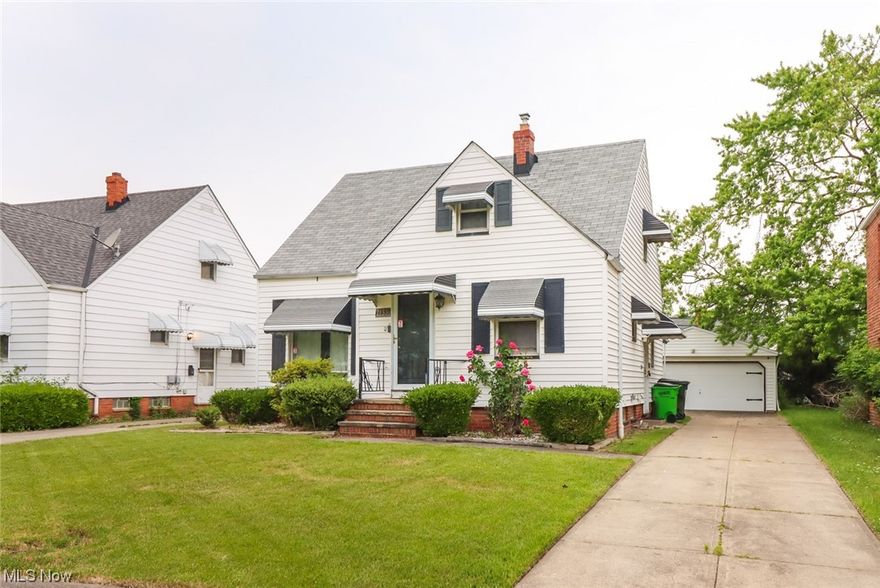 Expanded and ready to move into Bungalow featuring large eat-in kitchen, spacious living room w/ gleaming hardwood floors, large 2nd floor bedroom  suite and big finished rec room w/ full bath w/ wheel-chair access. The private rear yard w/ covered patio is a real treat and the home has newer garage, roof and vinyl siding.