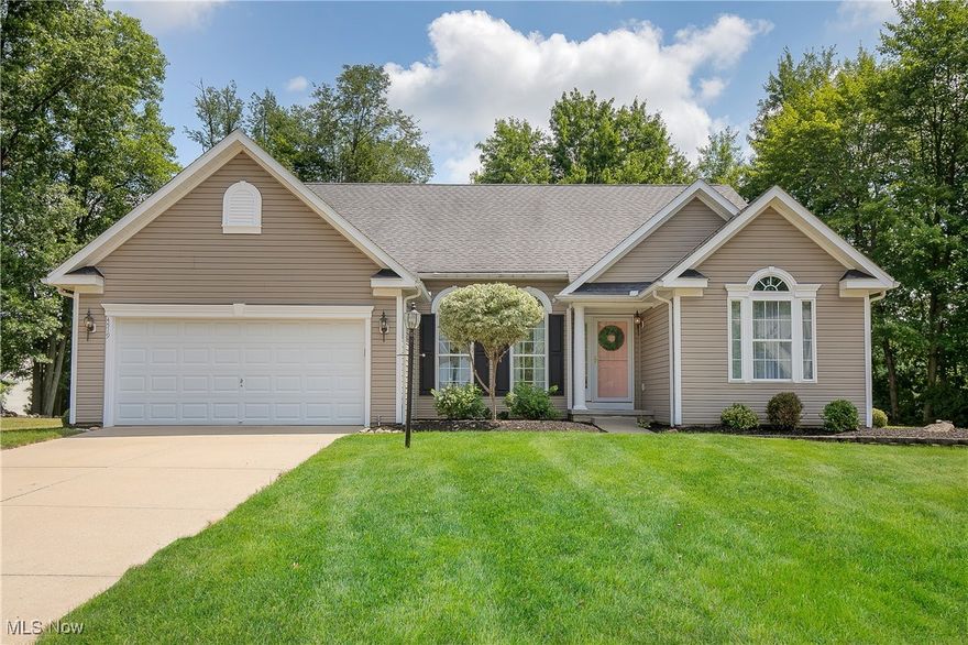 Welcome home to the ranch you have been searching for on a cul-de-sac in the highly sought-after Kings Ridge community, this beautifully maintained home in Green Local Schools is a rare find.

From the moment you arrive, you'll be impressed by the private, tree-lined backyard and the serene setting this property offers. Step inside to an inviting open-concept floor plan, where a spacious great room with expansive windows frames tranquil views of nature—your own peaceful retreat right at home.

A highlight of the layout is the split-bedroom design, providing enhanced privacy in the primary suite, thoughtfully positioned away from secondary bedrooms. The primary suite features a tray ceiling with ambient lighting, double sink vanity, soaking tub, and separate shower—a relaxing escape at the end of the day.

The 10-foot ceilings throughout the main level bring in light and airiness that’s hard to find, while the open staircase leads to a professionally finished lower level that lives like a natural extension of the first floor. This flexible space is perfect for a theater room, play area, home gym, or game room—endless possibilities for how you live. This property already has a radon mitigation system installed.

Step outside to enjoy the backyard patio, ideal for summer evenings, entertaining guests, or simply unwinding with a good book. The mature landscaping and tree-lined lot offer peace, privacy, and the charm of outdoor living.

Cherished by its current owners, this home is ready to welcome its next chapter with buyers who will love it as they have.