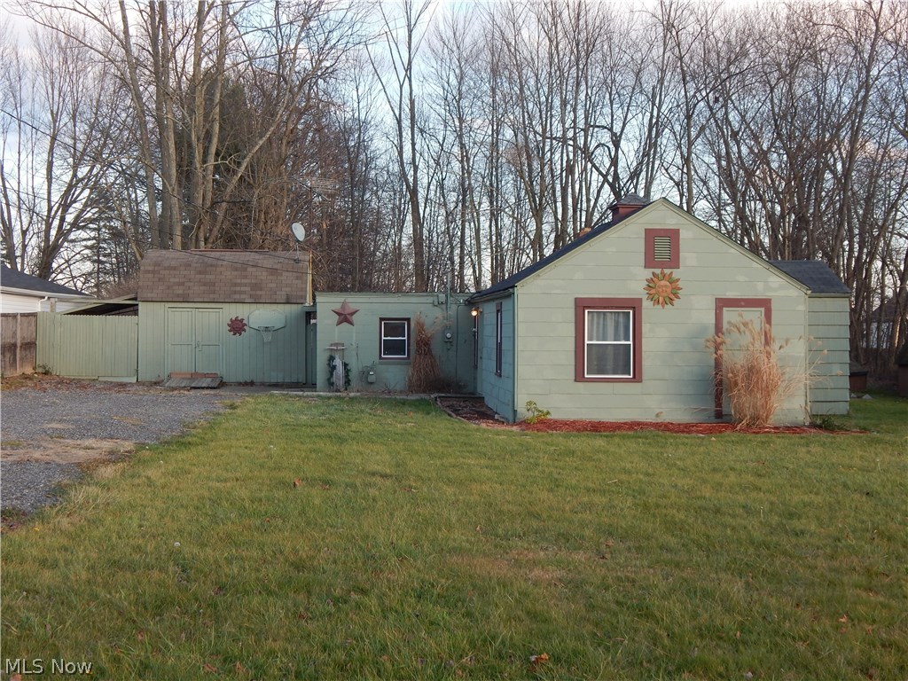 Come see this cozy 3 bedroom 1 bath Ranch home in Champion. This home features a large, updated eat-in kitchen with maple cabinets, newer counter tops and back splash. Private fenced in backyard. Outbuilding with loft and electric for a great workshop and/or storage. First floor laundry. Call today and take a look.