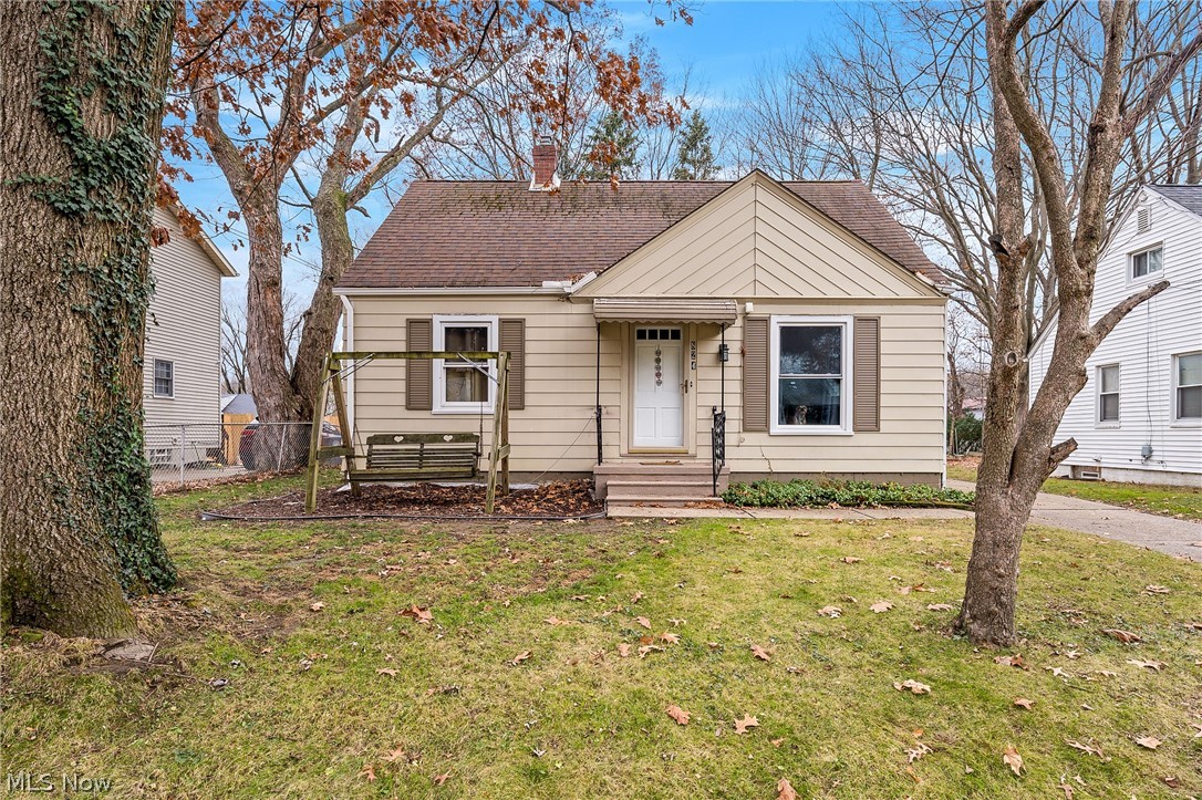 Move right in! This 3BD/1.5BA Goodyear Heights Cape Cod is cute as a button and ready for its new owners. The main level has original hardwood flooring throughout the living room and both bedrooms, and the full bathroom has been updated recently with a newer tub surround and commode (2019). Upstairs is an extra-large third bedroom with loads of natural wood paneling, hardwood floors, and clever built-in storage space. The light and bright kitchen with a charming faux brick wall comes furnished with all appliances and provides easy access to the driveway through a convenient side door that was replaced in 2021. Downstairs, the basement has been partially finished and transformed into a spacious recreation room with luxury vinyl plank flooring (2020), and a half bath was added for extra convenience (2020). Enjoy the plentiful storage provided on the unfinished side, as well as a clean and bright laundry area (Washer/Dryer included). The backyard with fenced dog run includes a 1 car garag