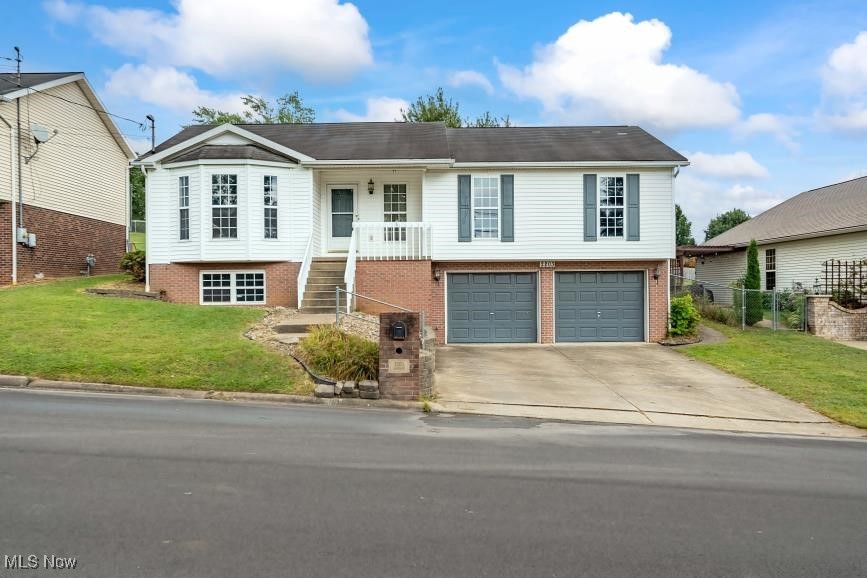 Need {{{SPACE}}} both inside & out? Then this 4 Bed, 3 Full Bath Home with 3 Sitting Rooms, 2 Garages, One Built In & One Detached & a Double Lot with Alley Access is just what you are looking for. This Home has something for everyone, with rooms big enough for everyone to be together or plenty of areas to {{{spread out}}}. On the Main Level, you have a 12x12 Kitchen big enough for a table & a separate 11x10 Dining Room. Also on the Main Level, you have a 19x19 Living Room & a 16x12 Family Room, plus 3 Bedrooms & 2 Full Baths. The Lower Level has the 17x17 Rec Room, the Laundry Room, a Bedroom & the other Full Bath, plus access to your Built-In 2 Stall Garage. The back of the Home has a 12x10 Screened In Porch, the 24x20 Detached Garage & the Fenced-in Yard with Alley Access. The Home is located in a Great South Parkersburg neighborhood & close to everything. **Seller would consider an allowance for painting or flooring with a reasonable offer**