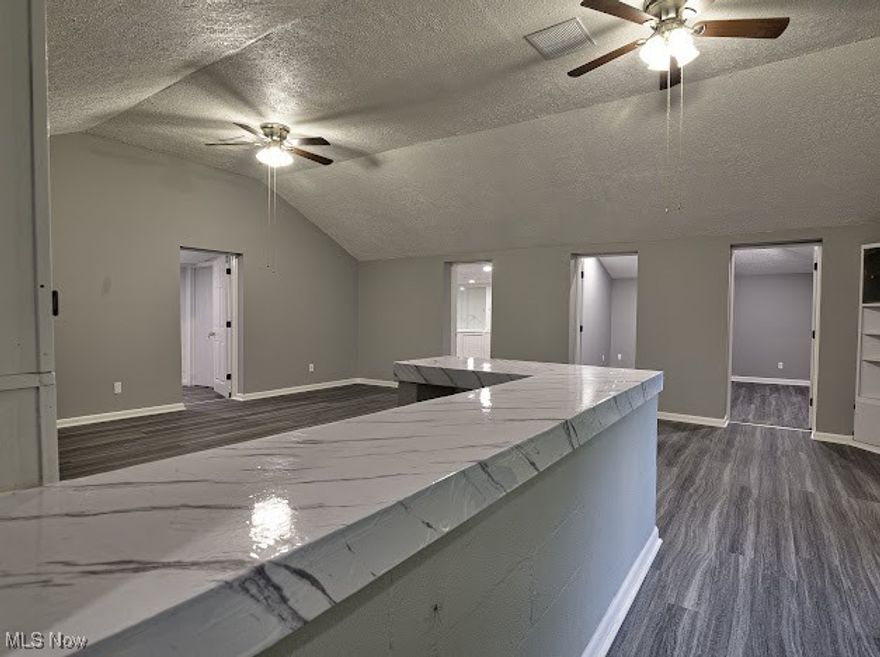 This half of the duplex is for commercial space and is for rent at $900/month plus all utilities and $900 deposit. Both the commercial and residential halves are both available and can both be rented for $2000/month plus all utilities and $2000 deposit.  These units are connected through a hallway. The tenant is responsible to check zoning. Call or text to see today!